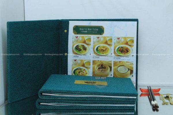 Menu bìa vải màu xanh khổ ngang của nhà hàng LAIKEE